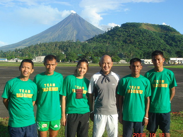 Team Bald Runner in Legazpi City with Lignon Hill and Mt Mayon as background