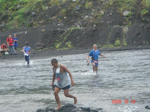 Bald Runner Crossing The Yawa River