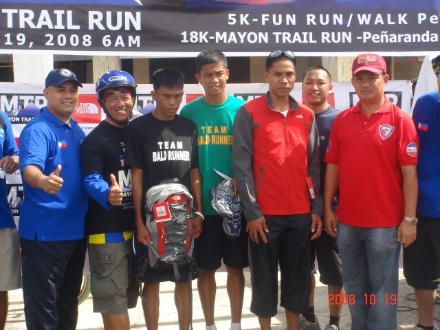 Team Bald Runner Awarded as the "King of Mount Mayon" by The City Mayor of Legazpi (In Red Shirt & Cap)