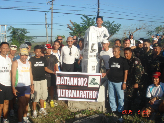 Another Group Picture With The Bataan 102 Logo