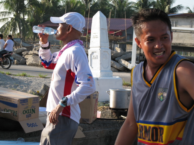 Lots of Water To Drink at Km #50 & the Smiling Capt Quilo