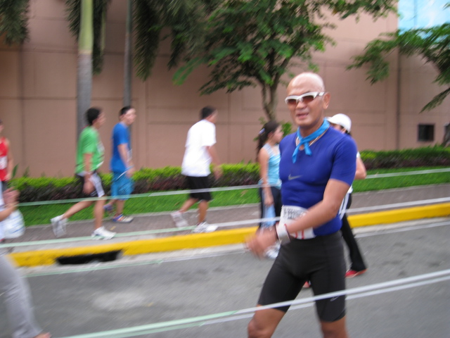 The Smiling Bald Runner