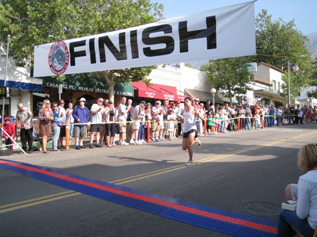 Arrival of the 1st Runner to Reach The Finish Line