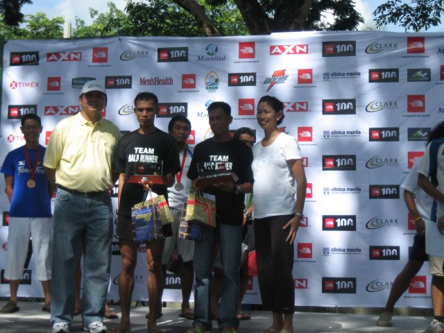 Cris & Rey of Team Bald Runner as Champions in the 100K Relay Race