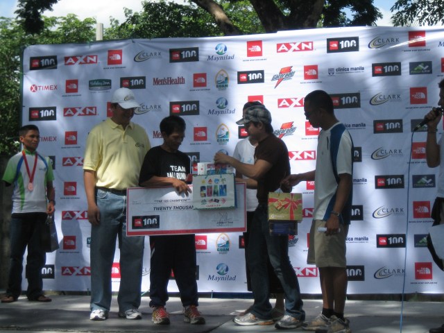 Eduardo Villanueva as The Champion in the TNF 100K Clark Solo Run Receiving His Prize & Gifts from TNF