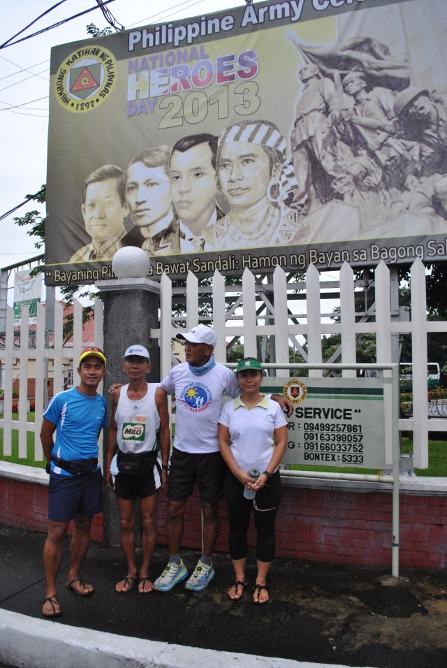 Posing In Front Of The Philippine Army Tarp