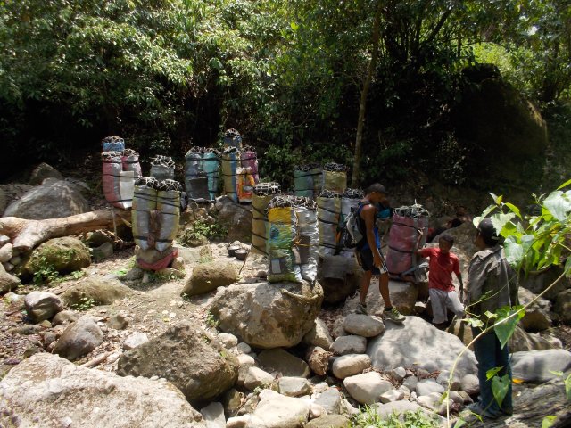 Sacks Of Charcoal On Top Of Rocks