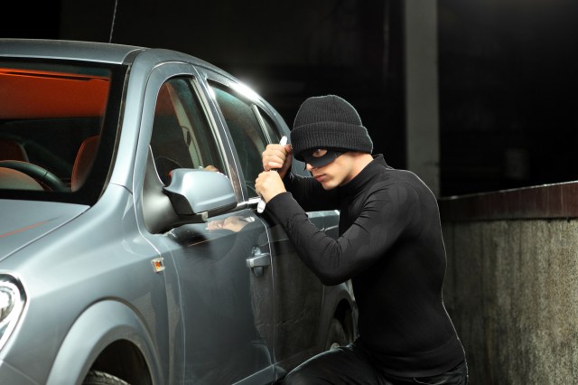 A Thief Trying To Open A Locked Car (Picture From Google)